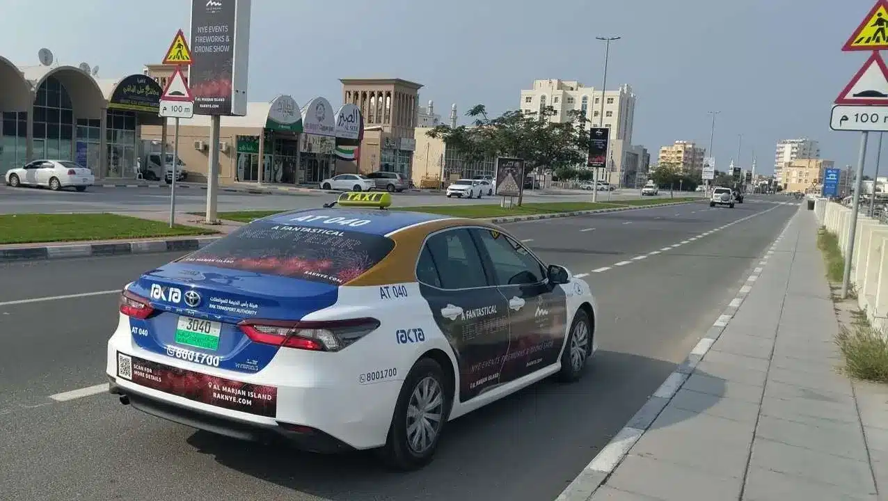 Who offers customizable ad placements on taxis in Dubai?